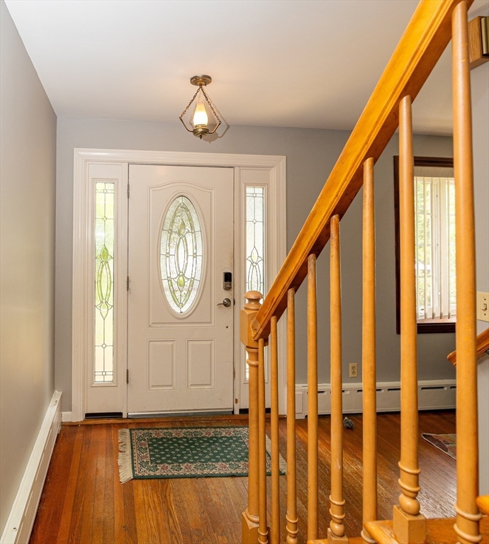 300 Mason Rd Extension Dudley, MA 01571 - Photo 23 of 42 a view of an entryway with wooden floor