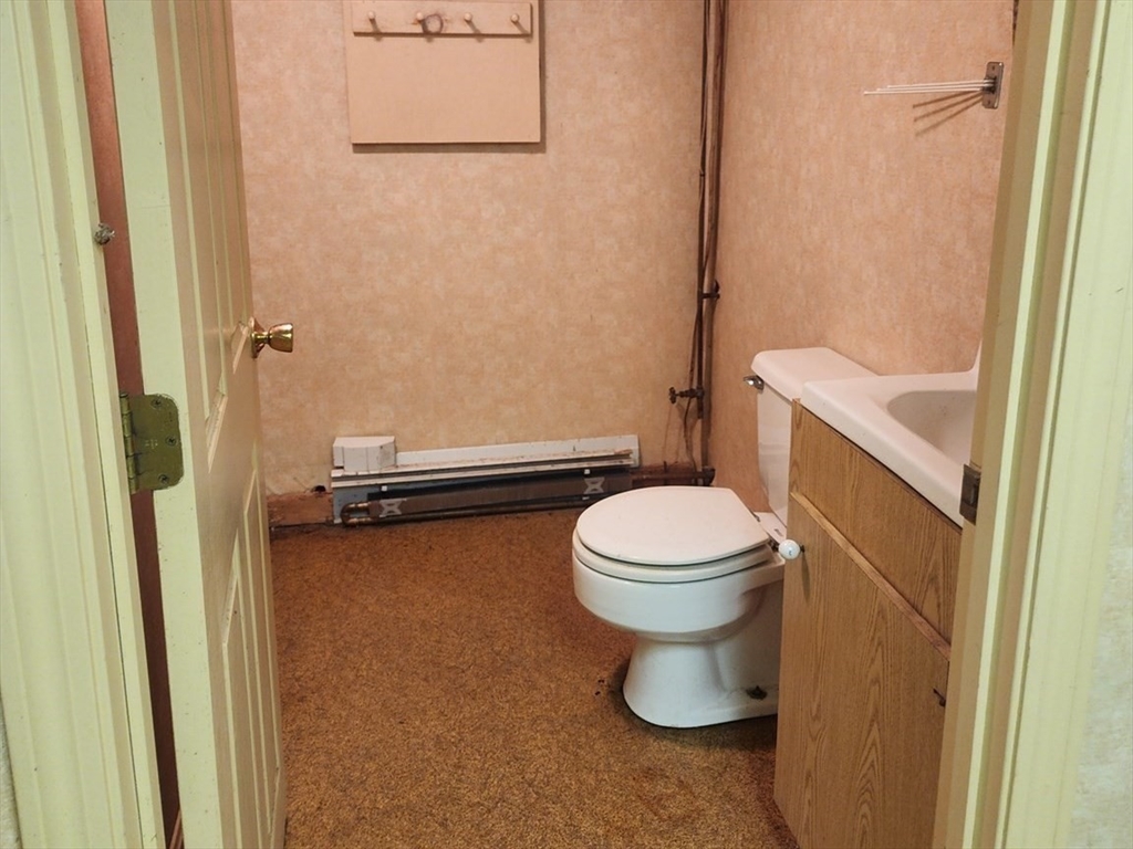 300 Mason Rd Extension Dudley, MA 01571 - Photo 33 of 42 a bathroom with a toilet and a shower