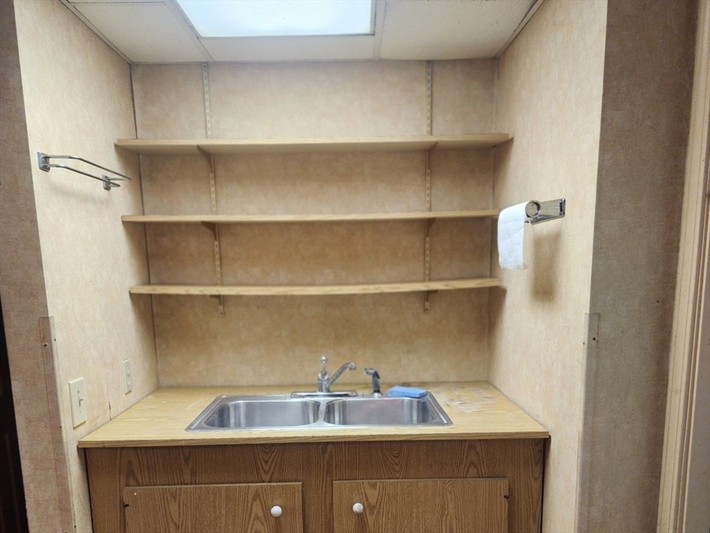 300 Mason Rd Extension Dudley, MA 01571 - Photo 34 of 42 a room with a cabinets