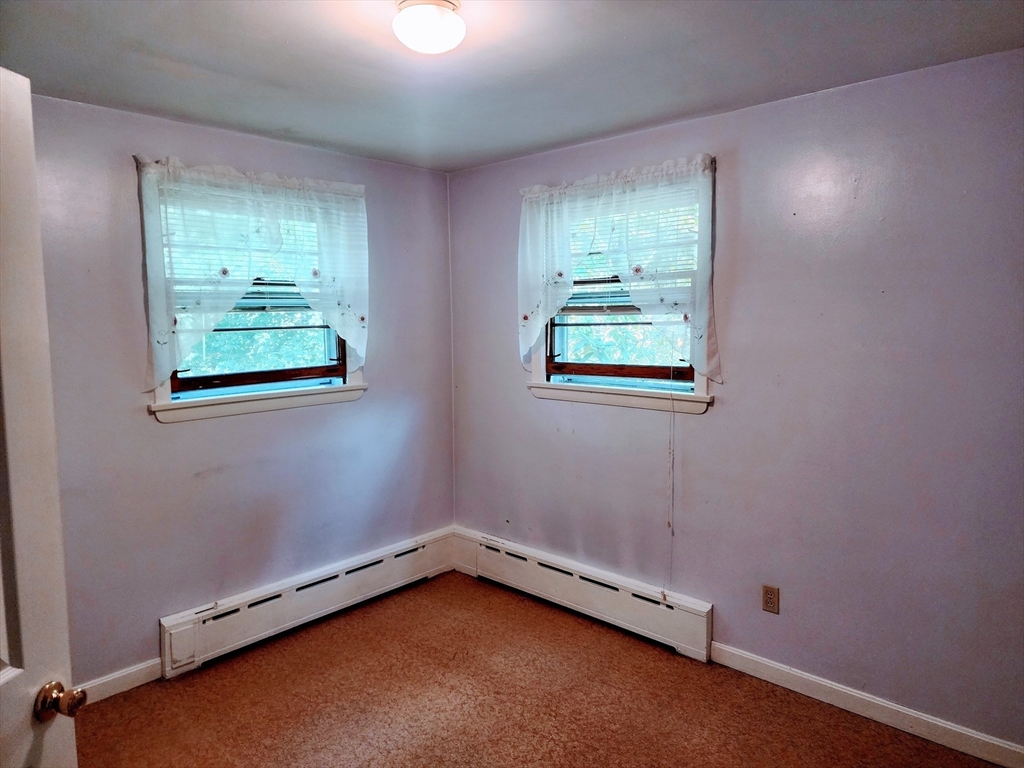 300 Mason Rd Extension Dudley, MA 01571 - Photo 36 of 42 an empty room with a window
