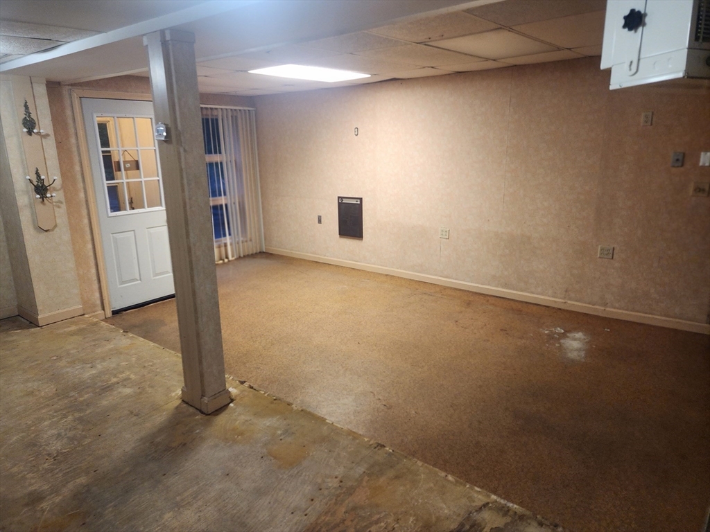 300 Mason Rd Extension Dudley, MA 01571 - Photo 39 of 42 an empty room with windows