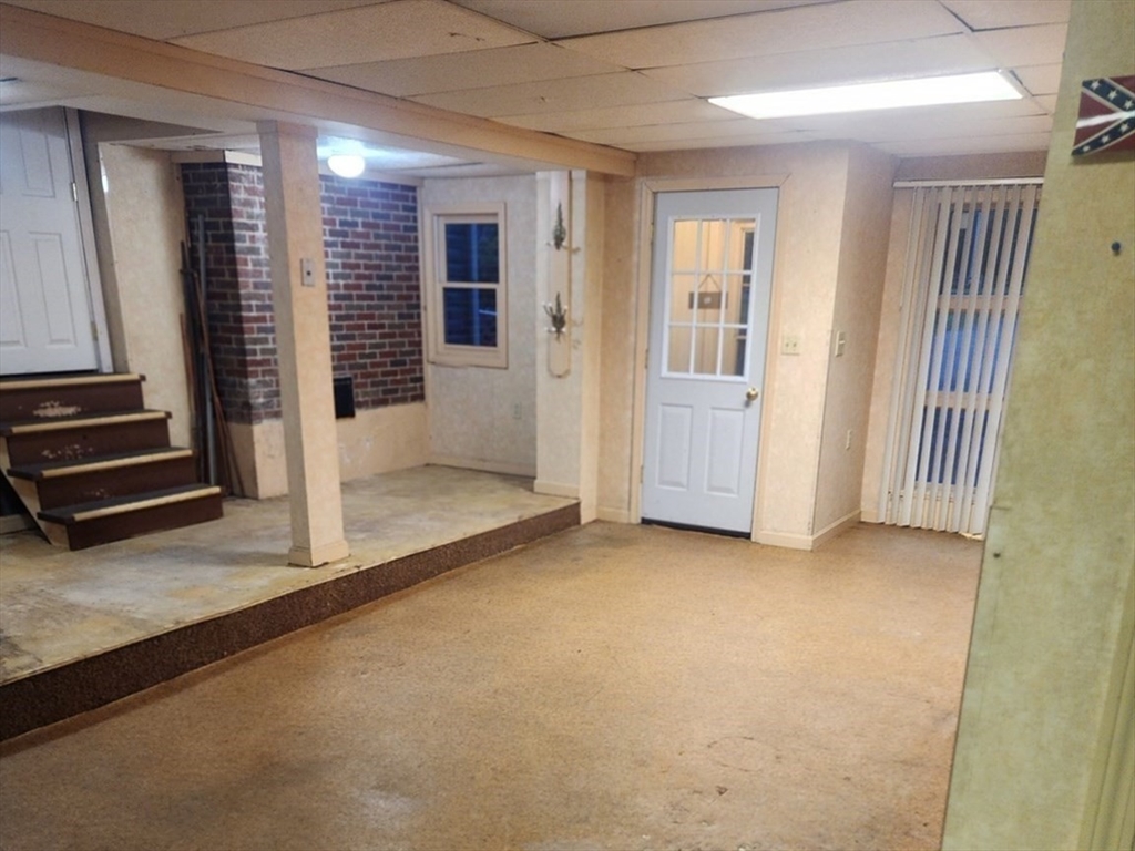300 Mason Rd Extension Dudley, MA 01571 - Photo 40 of 42 an empty room with windows