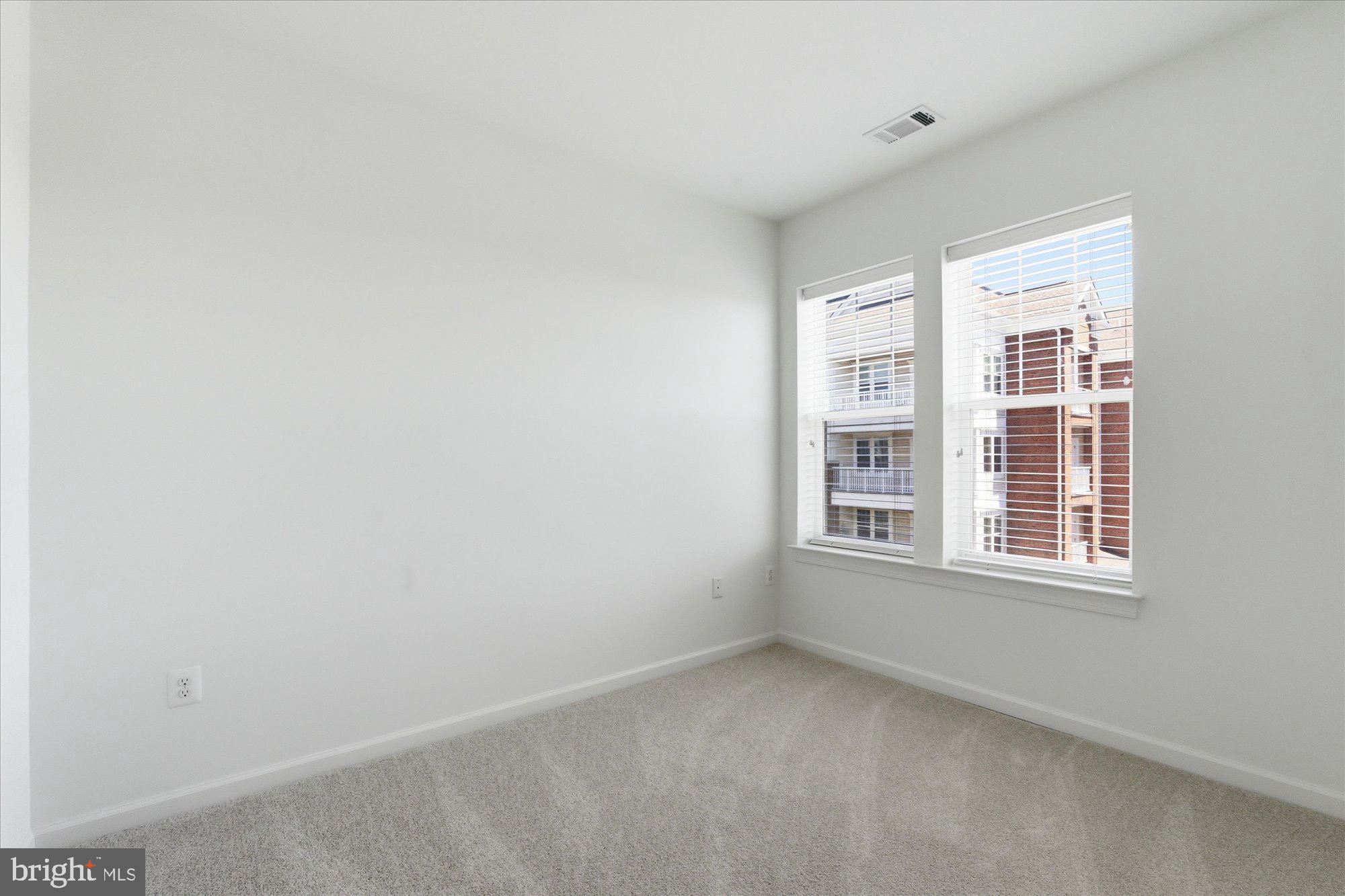 20650 Hope Spring Terrace, Unit 301 Ashburn, VA 20147 - Photo 26 of 35 Bedroom 2