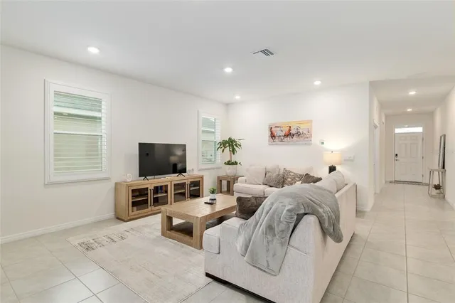 a view of a dining room with furniture window and outside view