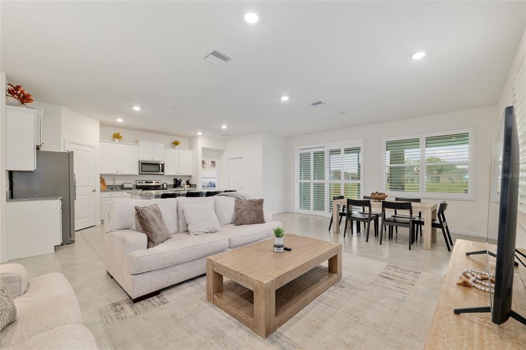5246 Northwest 43rd Ln Road Ocala, FL 34482 - Photo 14 of 84 a living room with furniture and a table