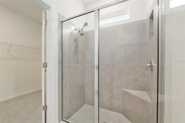 a view of a house with backyard and garden