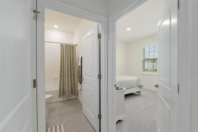 a view of a swimming pool and a yard