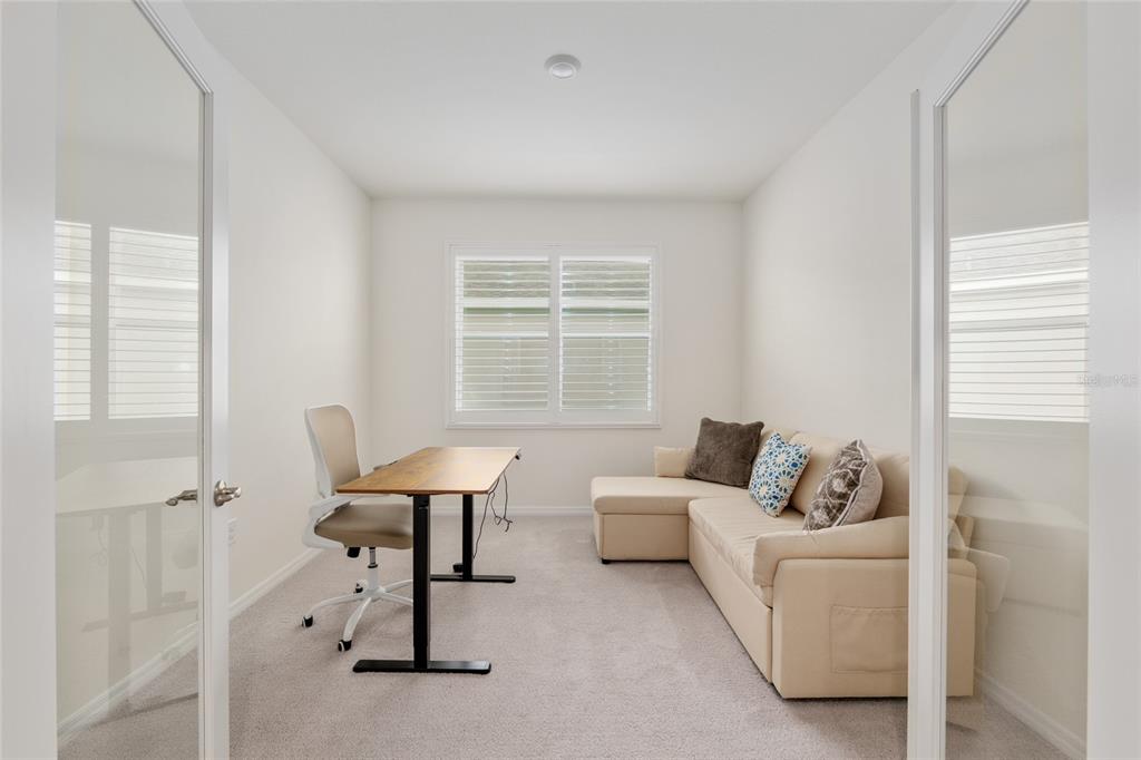 5246 Northwest 43rd Ln Road Ocala, FL 34482 - Photo 40 of 84 a living room with furniture and a window