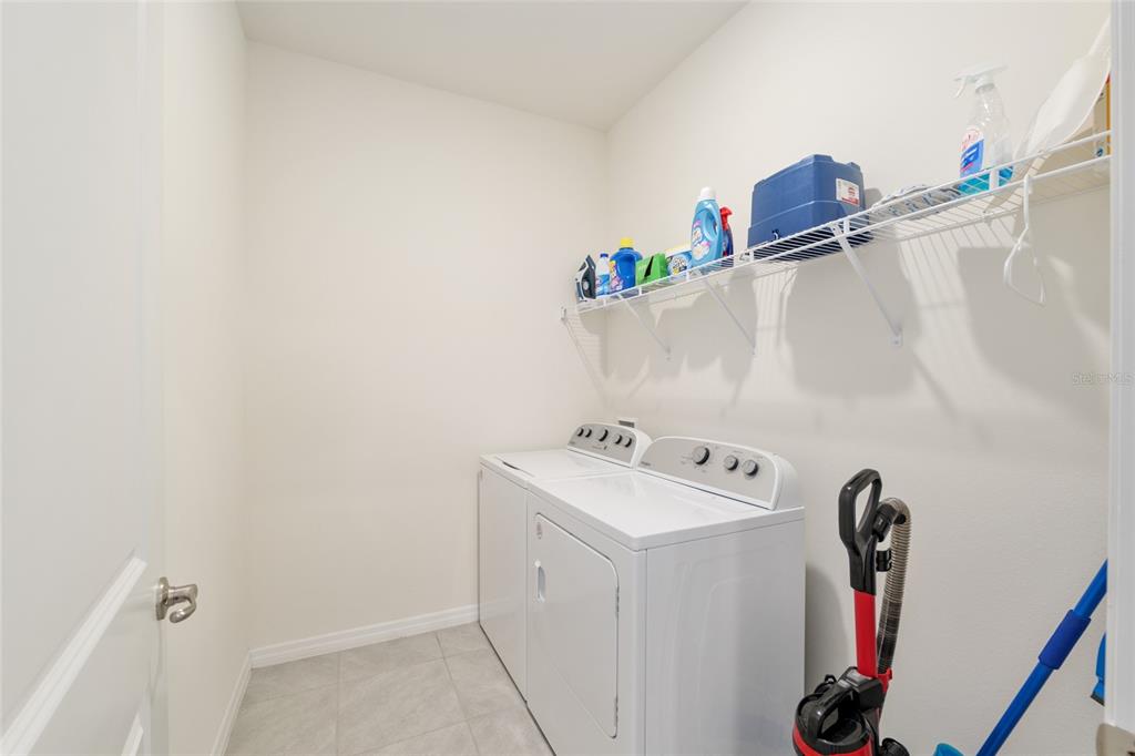 5246 Northwest 43rd Ln Road Ocala, FL 34482 - Photo 42 of 84 a utility room with dryer and washer
