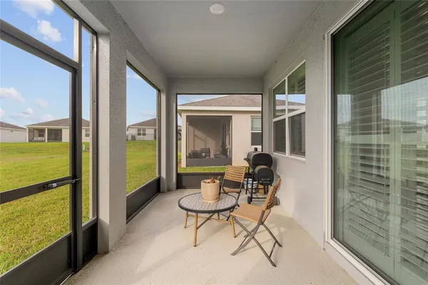 an aerial view of a houses with outdoor space