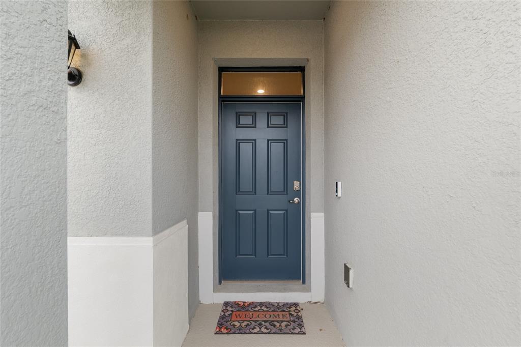 5246 Northwest 43rd Ln Road Ocala, FL 34482 - Photo 5 of 84 a view of an empty room with a door