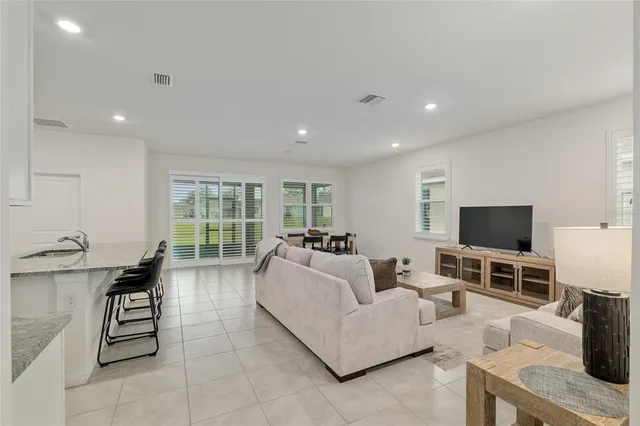 a living room with furniture and a couch