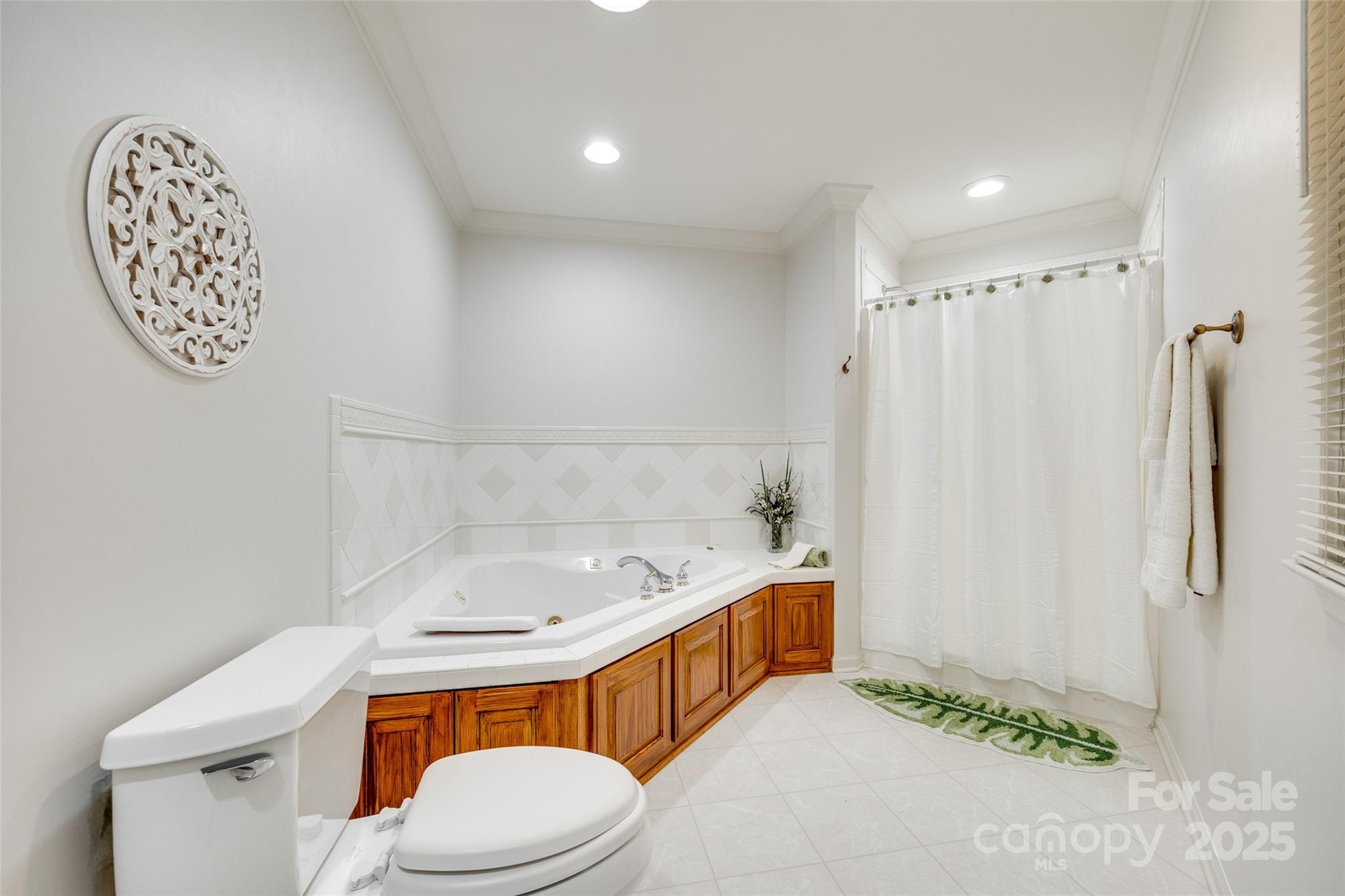 4307 Edgeland Road Edgemoor, SC 29712 - Photo 26 of 48 a bathroom with a sink a toilet and a shower