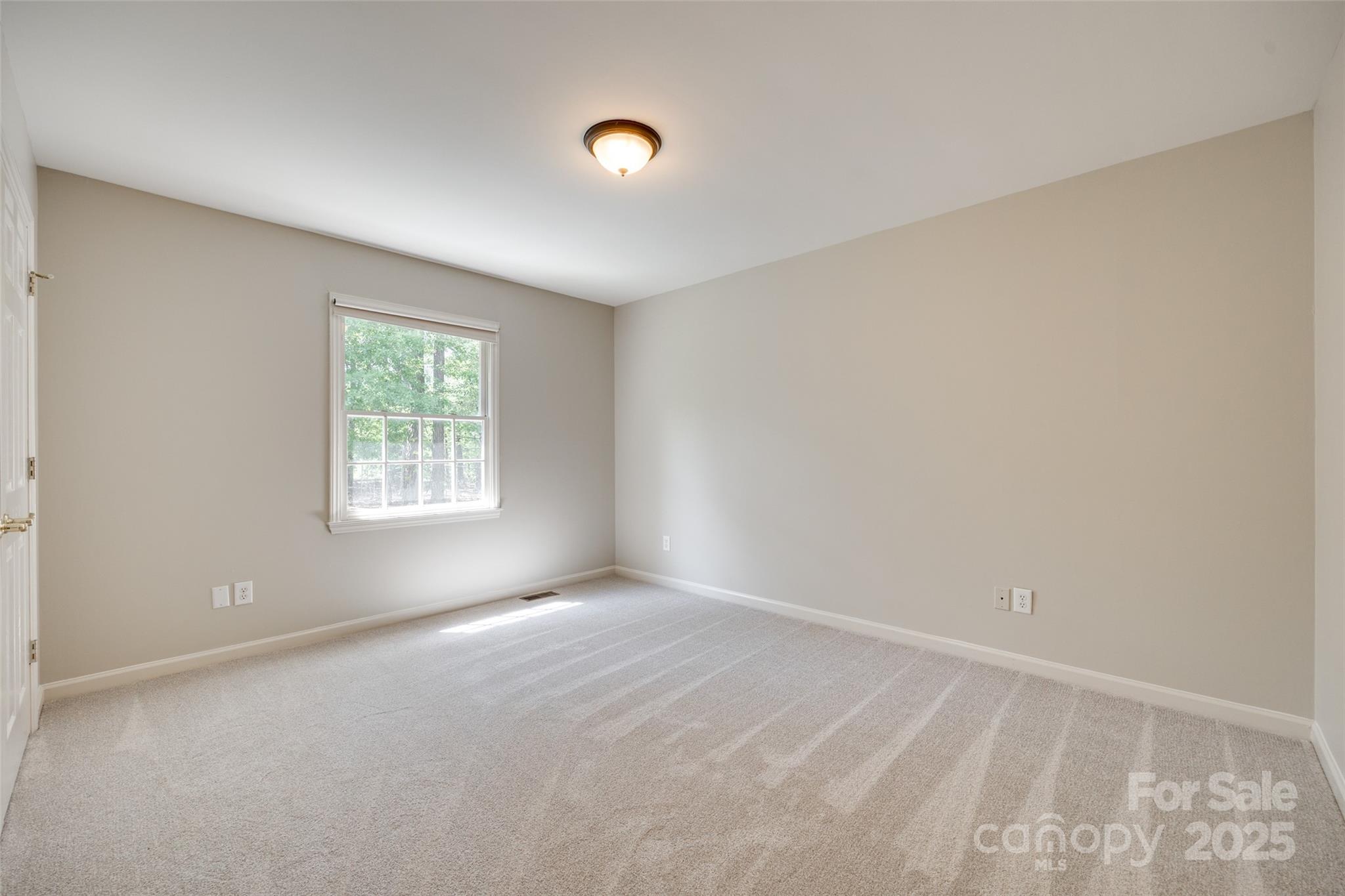 4307 Edgeland Road Edgemoor, SC 29712 - Photo 28 of 48 an empty room with windows