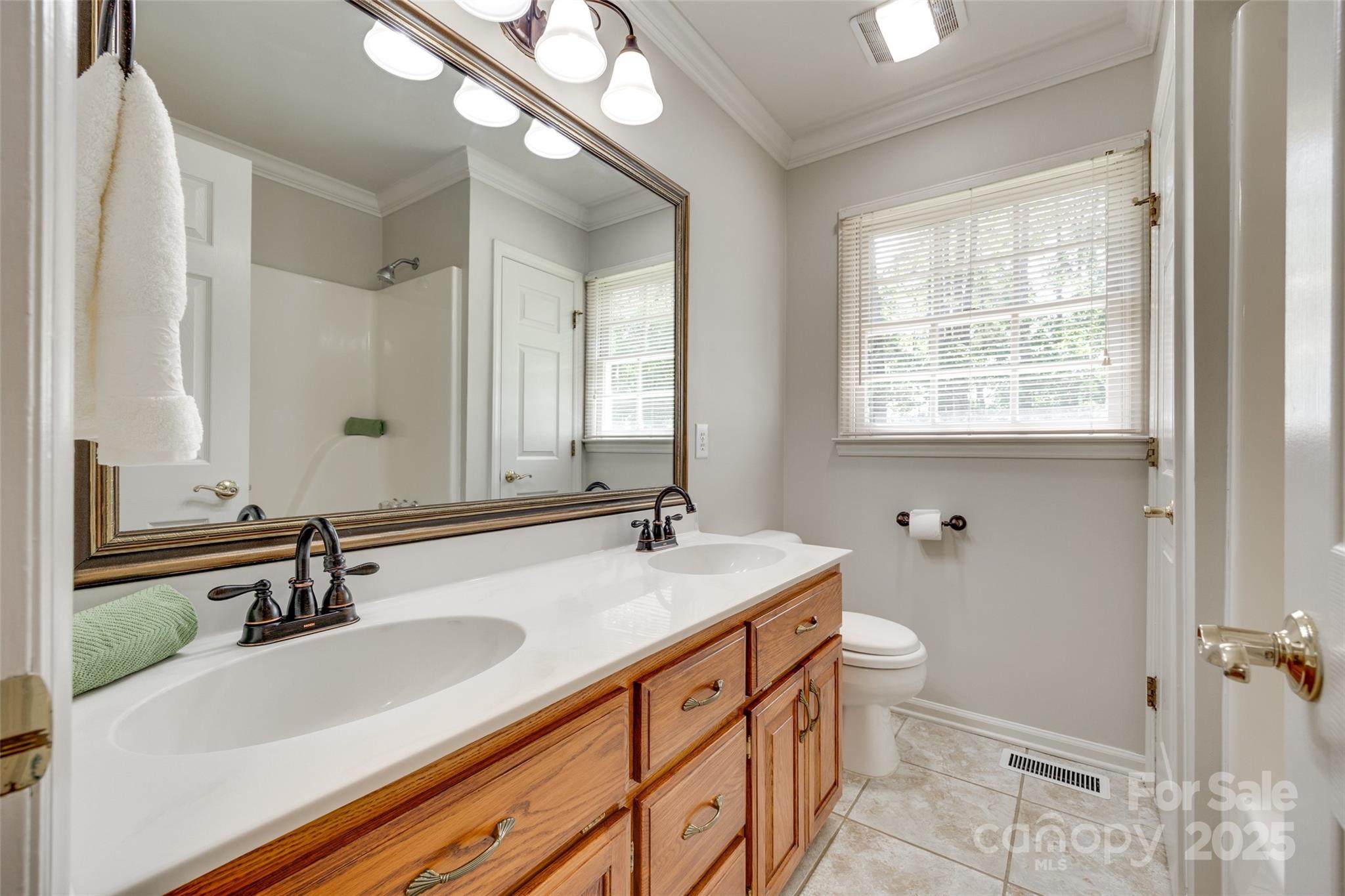4307 Edgeland Road Edgemoor, SC 29712 - Photo 29 of 48 a bathroom with a sink and a mirror