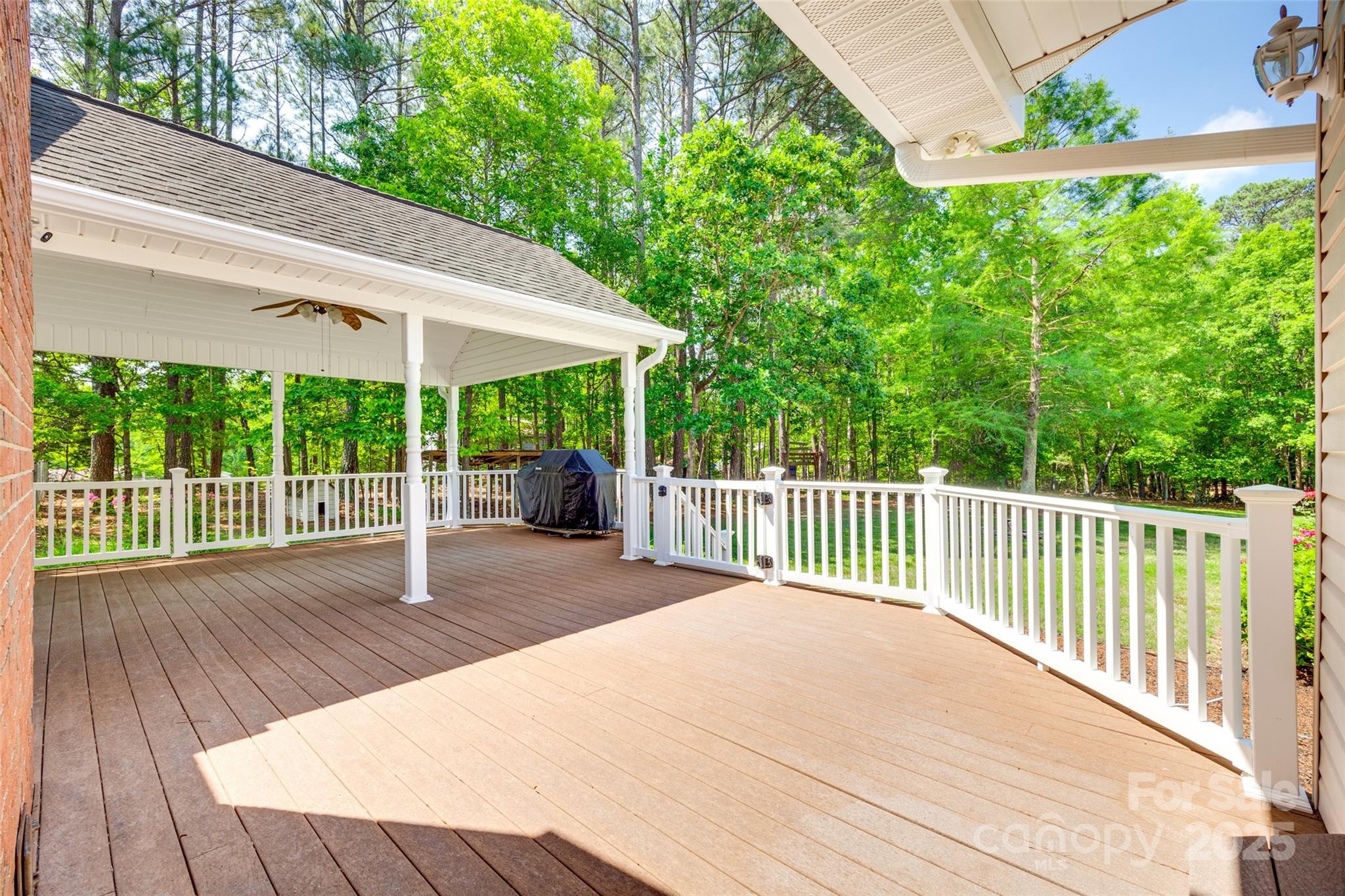 4307 Edgeland Road Edgemoor, SC 29712 - Photo 40 of 48 a view of a backyard with a deck and wooden floor