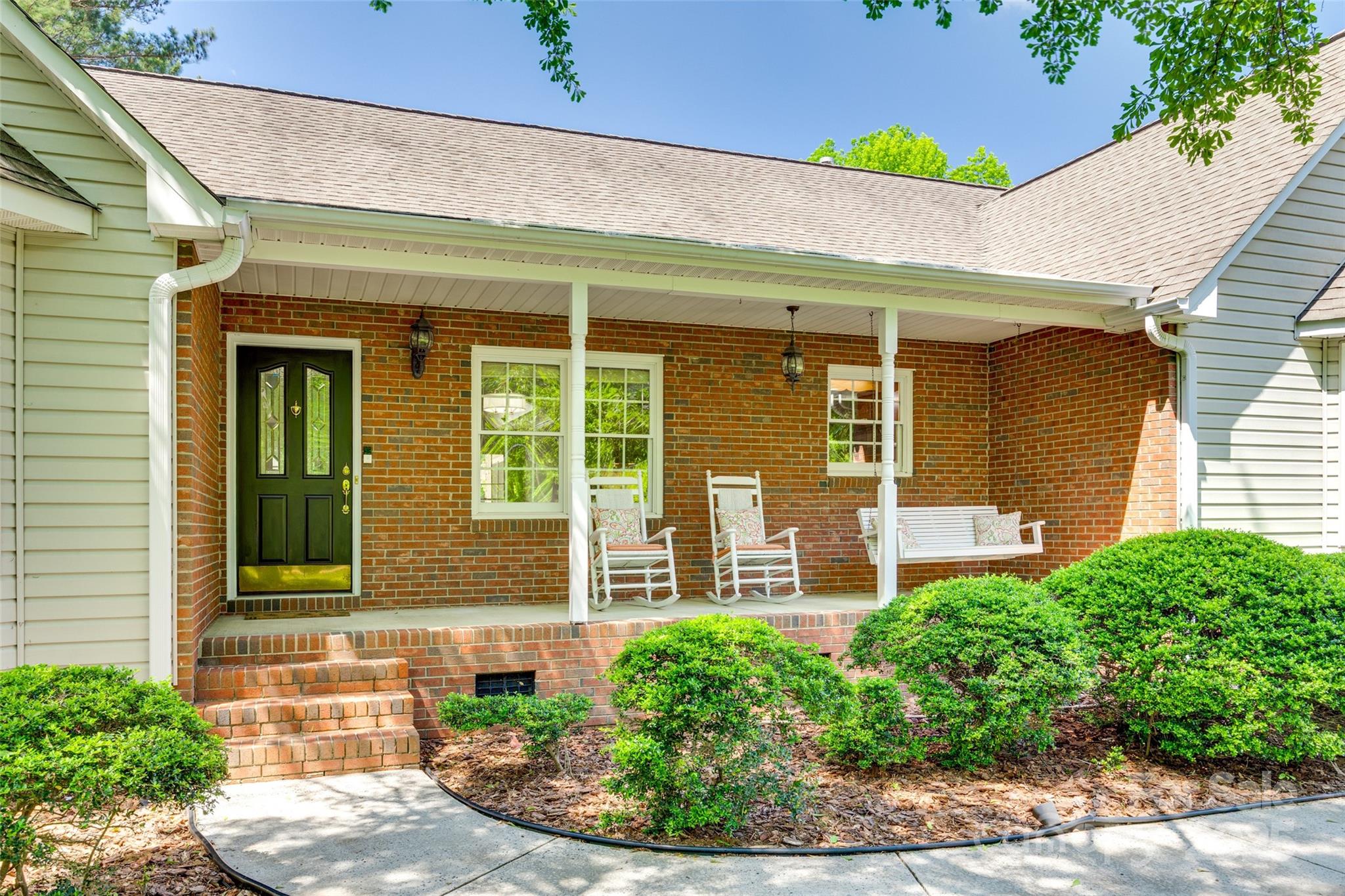 4307 Edgeland Road Edgemoor, SC 29712 - Photo 4 of 48 a front view of a house with garden