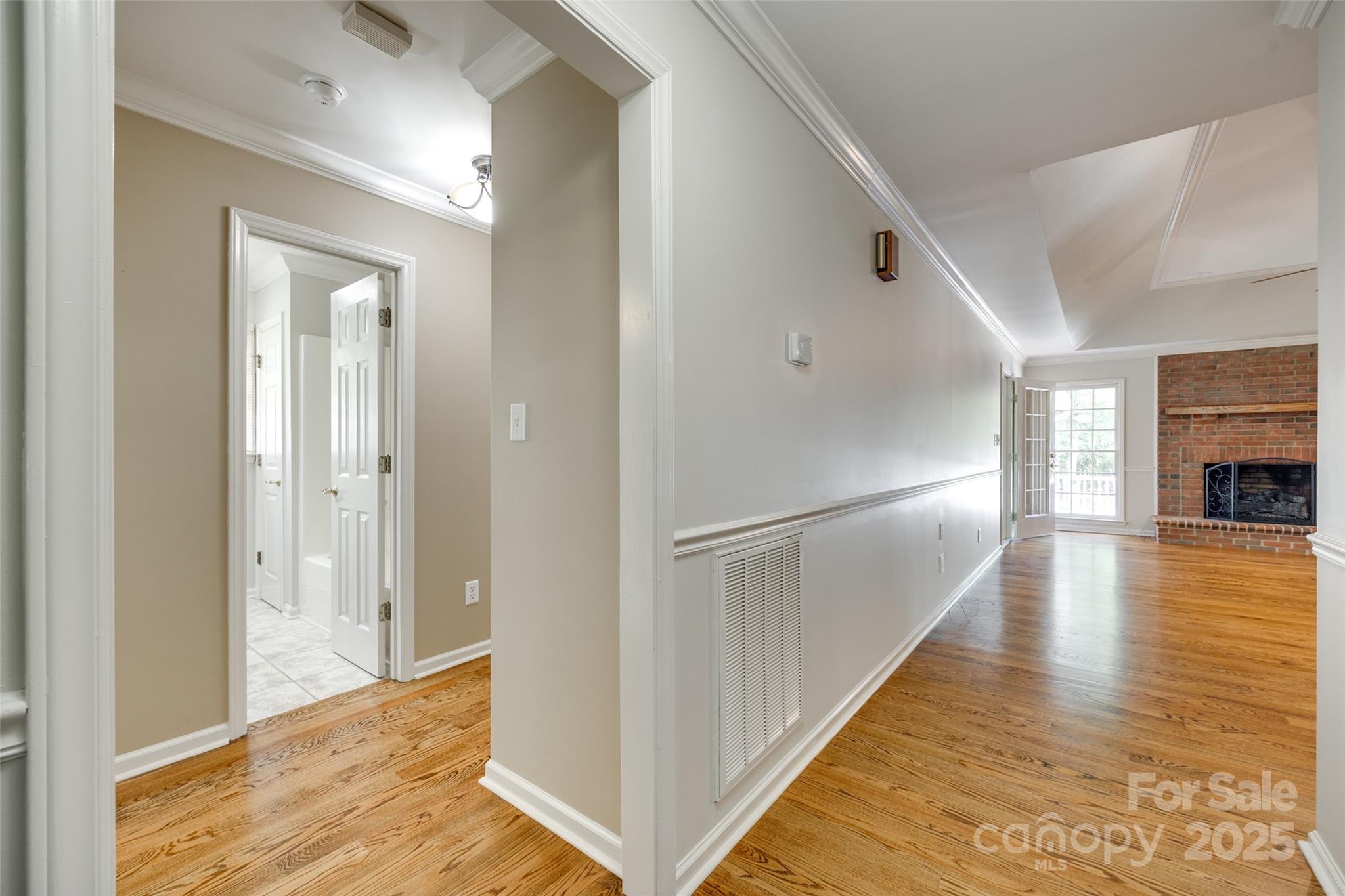 4307 Edgeland Road Edgemoor, SC 29712 - Photo 9 of 48 a view of a hallway view with wooden floor and staircase