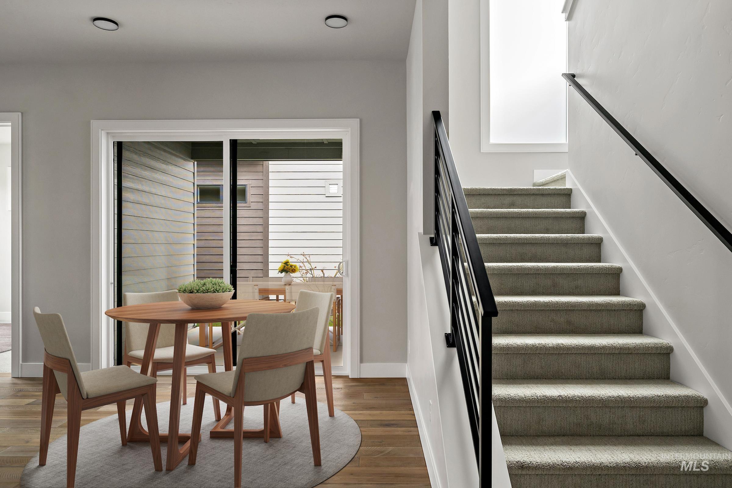 11709 North Rabbitbrush Way Boise, ID 83714 - Photo 18 of 31 Stairway with wood finished floors and baseboards
