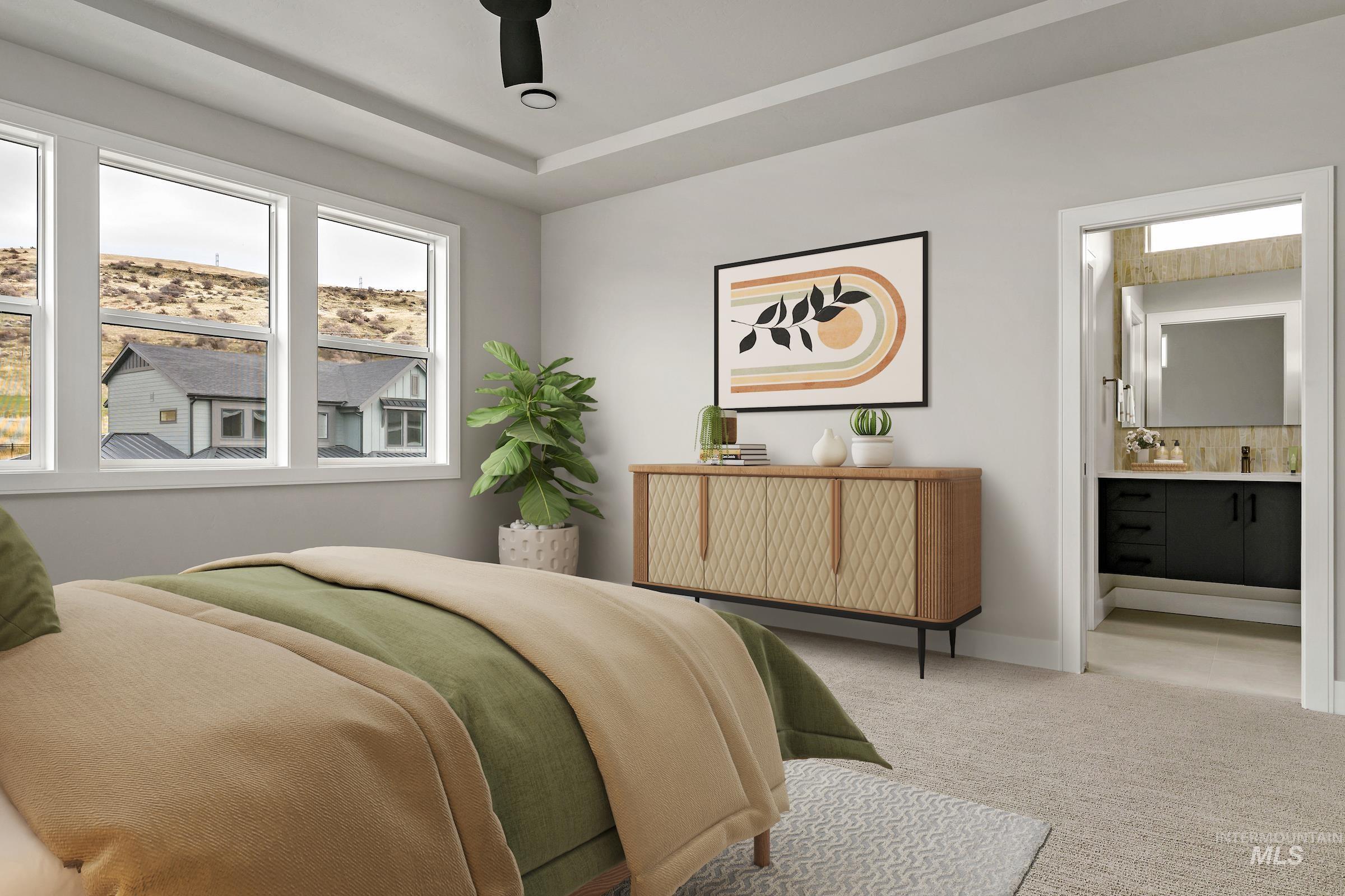 11709 North Rabbitbrush Way Boise, ID 83714 - Photo 22 of 31 Bedroom featuring carpet, ensuite bath, and ceiling fan