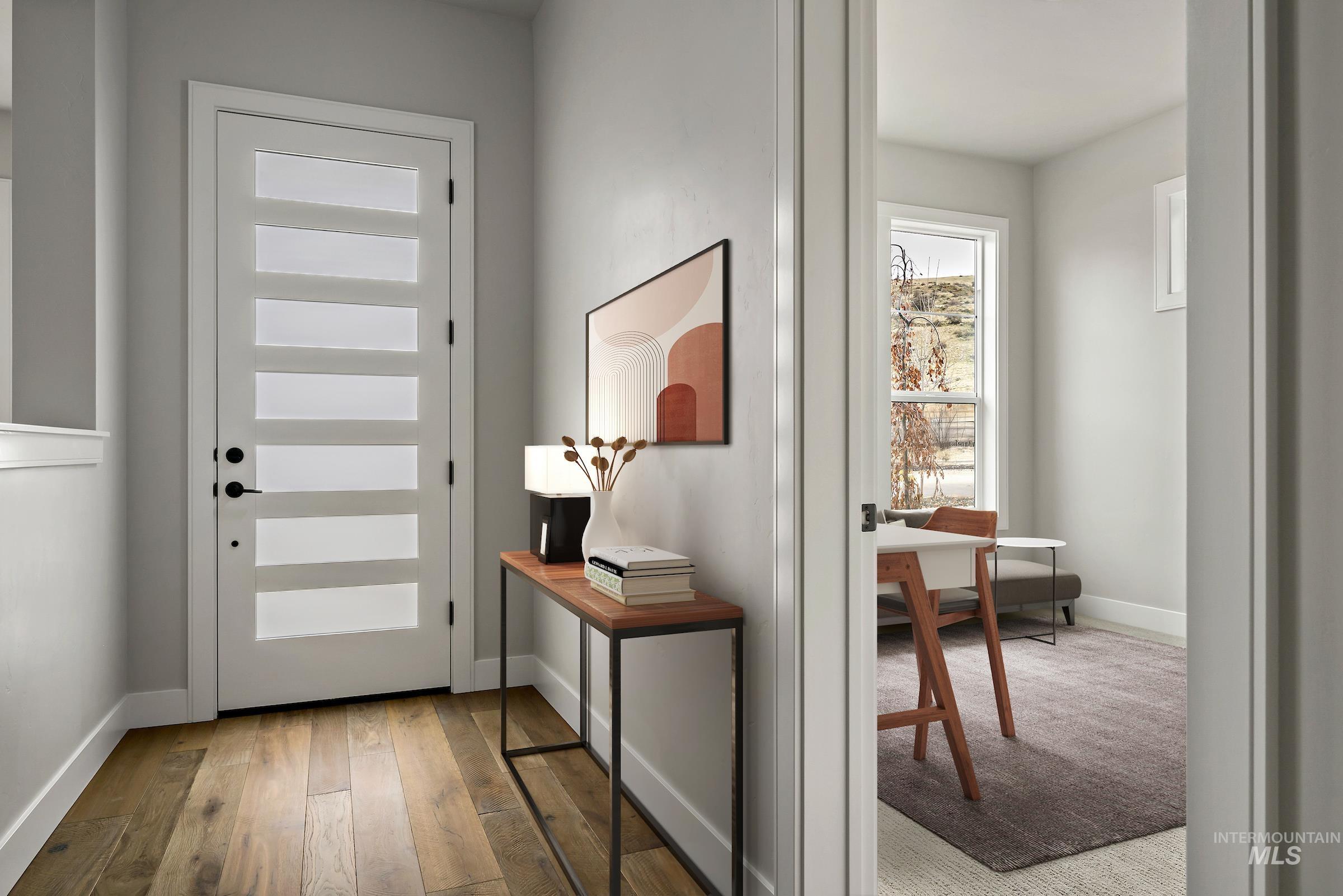 11709 North Rabbitbrush Way Boise, ID 83714 - Photo 5 of 31 Entryway with hardwood / wood-style flooring and baseboards