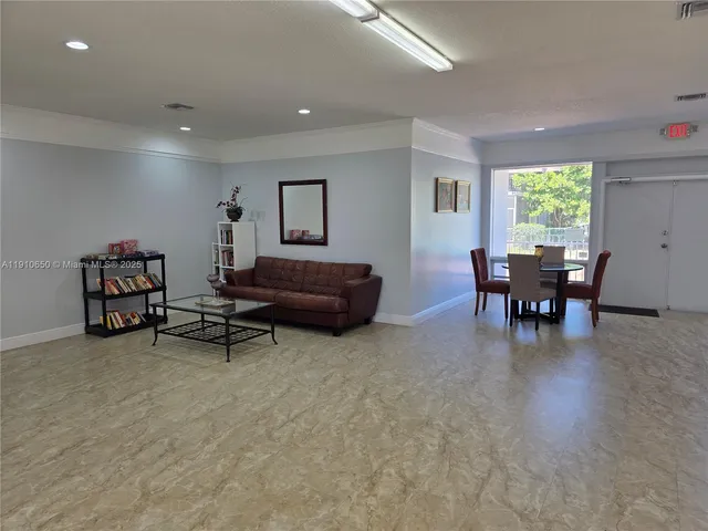 a view of a backyard with swimming pool
