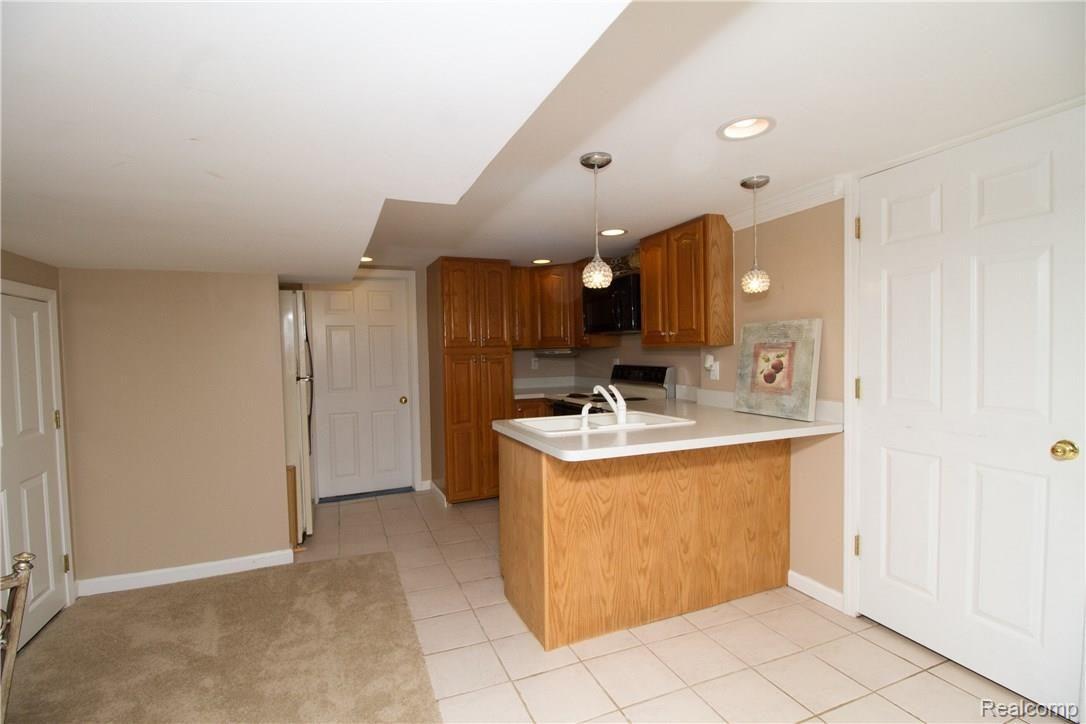6108 Pine Knob Road Clarkston, MI 48348 - Photo 45 of 48 With a Full Kitchen