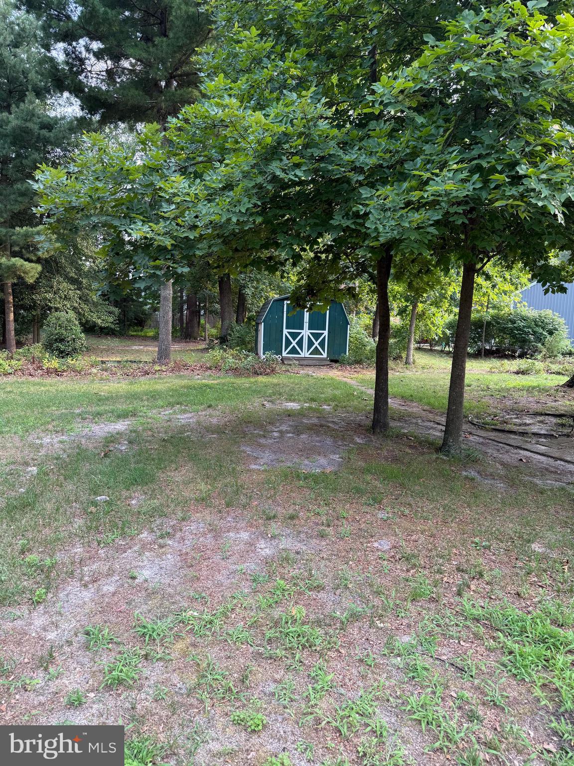 217 Carmel Road Millville, NJ 08332 - Photo 21 of 23 a view of a house with a backyard