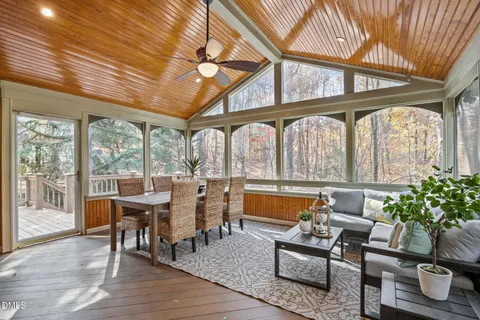 a bathroom with a toilet a sink and a mirror