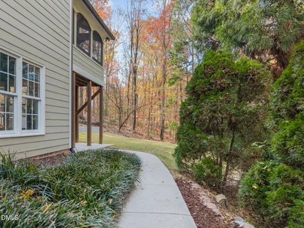 an aerial view of a house with outdoor space