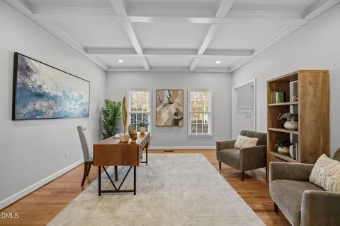 a workspace with furniture and a window