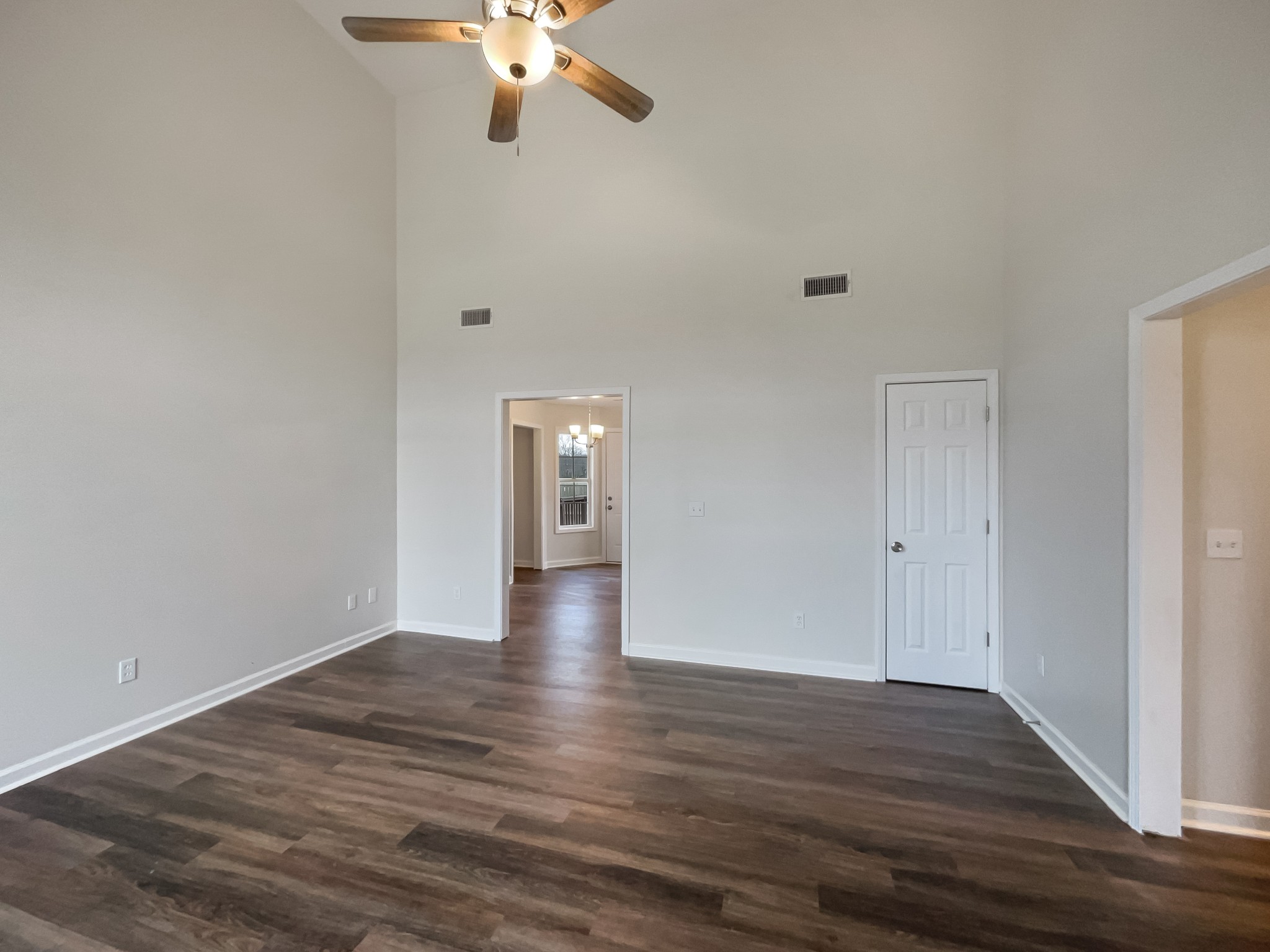 6180 Hoover Road Lascassas, TN 37085 - Photo 9 of 22 a view of an empty room with wooden floor