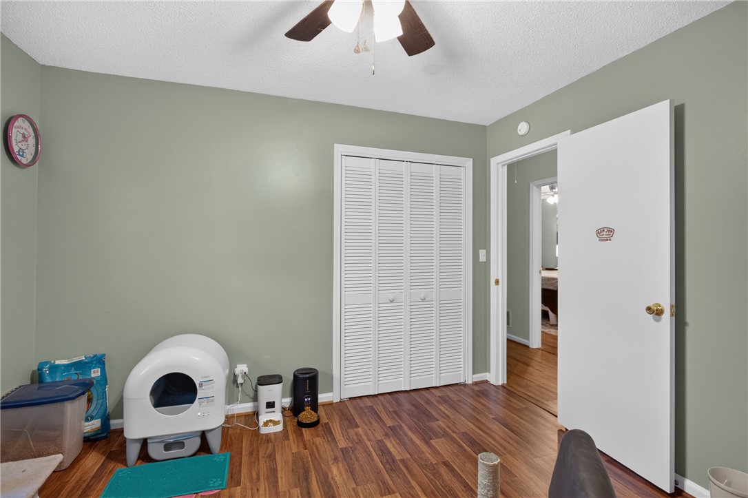 104 Laurel Lane Seneca, SC 29678 - Photo 21 of 36 Hardwood floors and a spacious closet create a functional and versatile area.
