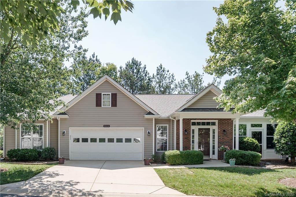 16616 Timber Crossing Road Charlotte, NC 28213 - Photo 1 of 40 a front view of a house with a garden