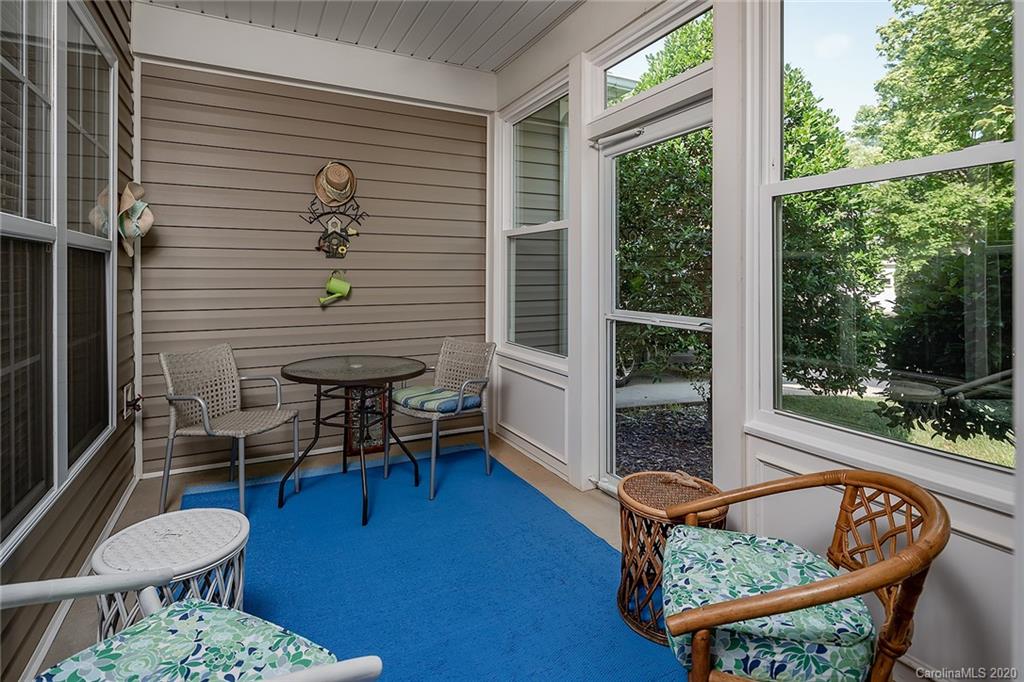 16616 Timber Crossing Road Charlotte, NC 28213 - Photo 12 of 40 a balcony with furniture and a potted plant