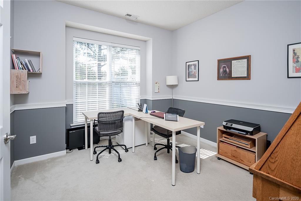 16616 Timber Crossing Road Charlotte, NC 28213 - Photo 15 of 40 a view of a workspace with furniture and a window