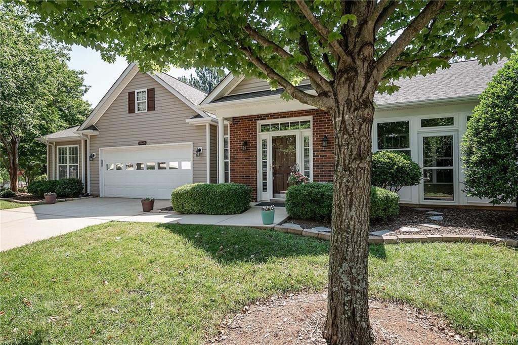 16616 Timber Crossing Road Charlotte, NC 28213 - Photo 3 of 40 a view of a house with backyard and a tree