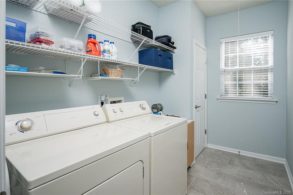 16616 Timber Crossing Road Charlotte, NC 28213 - Photo 26 of 40 a utility room with dryer and washer