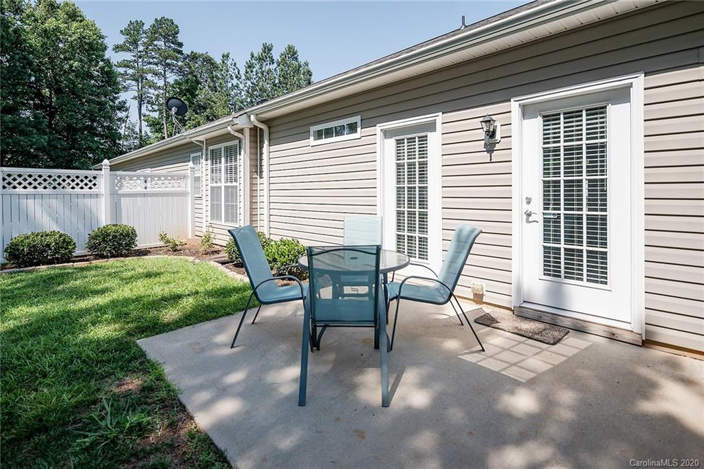 16616 Timber Crossing Road Charlotte, NC 28213 - Photo 35 of 40 a view of a house with backyard and sitting area