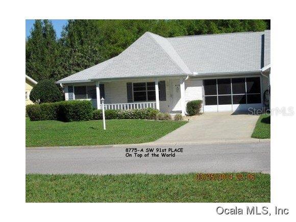 8775 Southwest 91st Place Ocala, FL 34481 - Photo 1 of 1 a view of a house with a yard