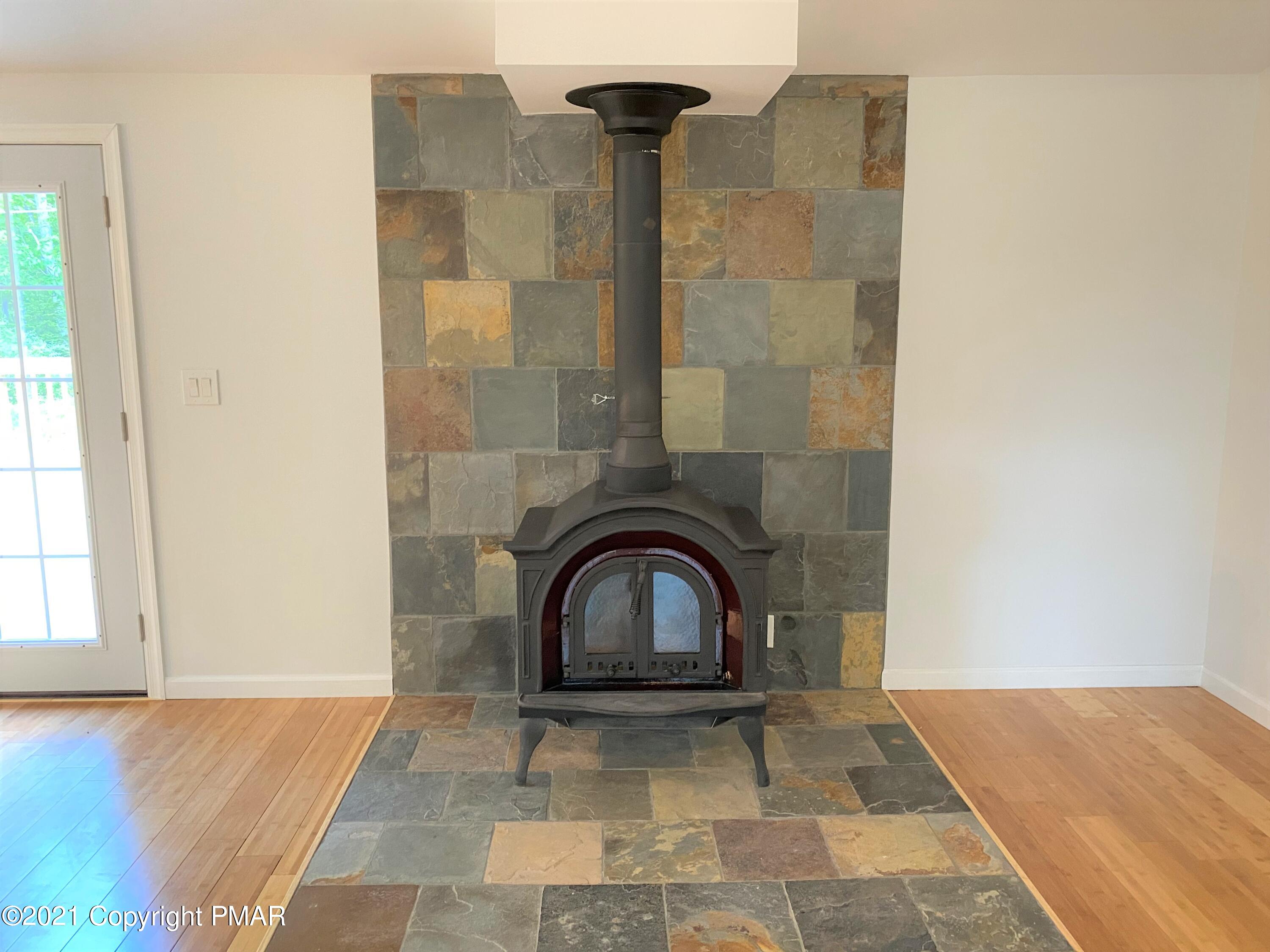 143 Britt Court Cresco, PA 18326 - Photo 12 of 35 a bathroom with a sink and a mirror