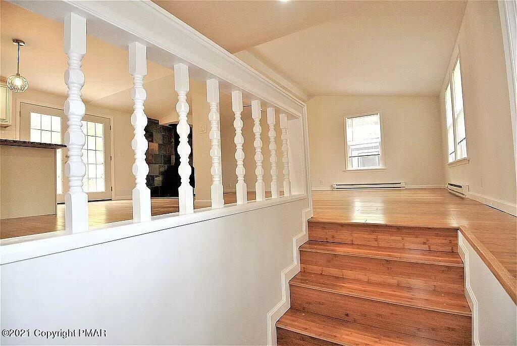 143 Britt Court Cresco, PA 18326 - Photo 13 of 35 a view of an entryway with wooden floor and door