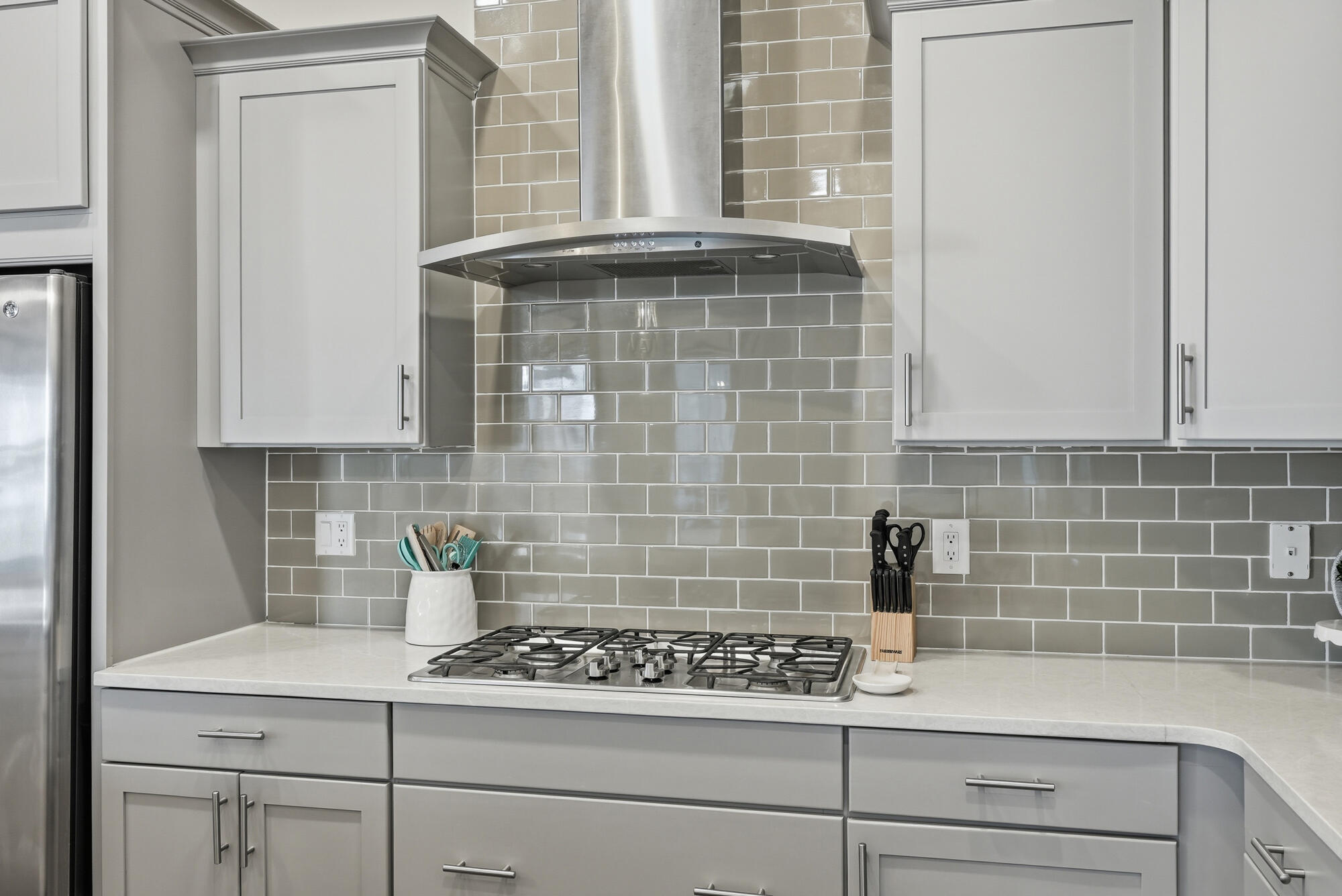 23 East York Ln Inlet Beach, Unit A Inlet Beach, FL 32461 - Photo 12 of 51 a kitchen with a stove and a shower