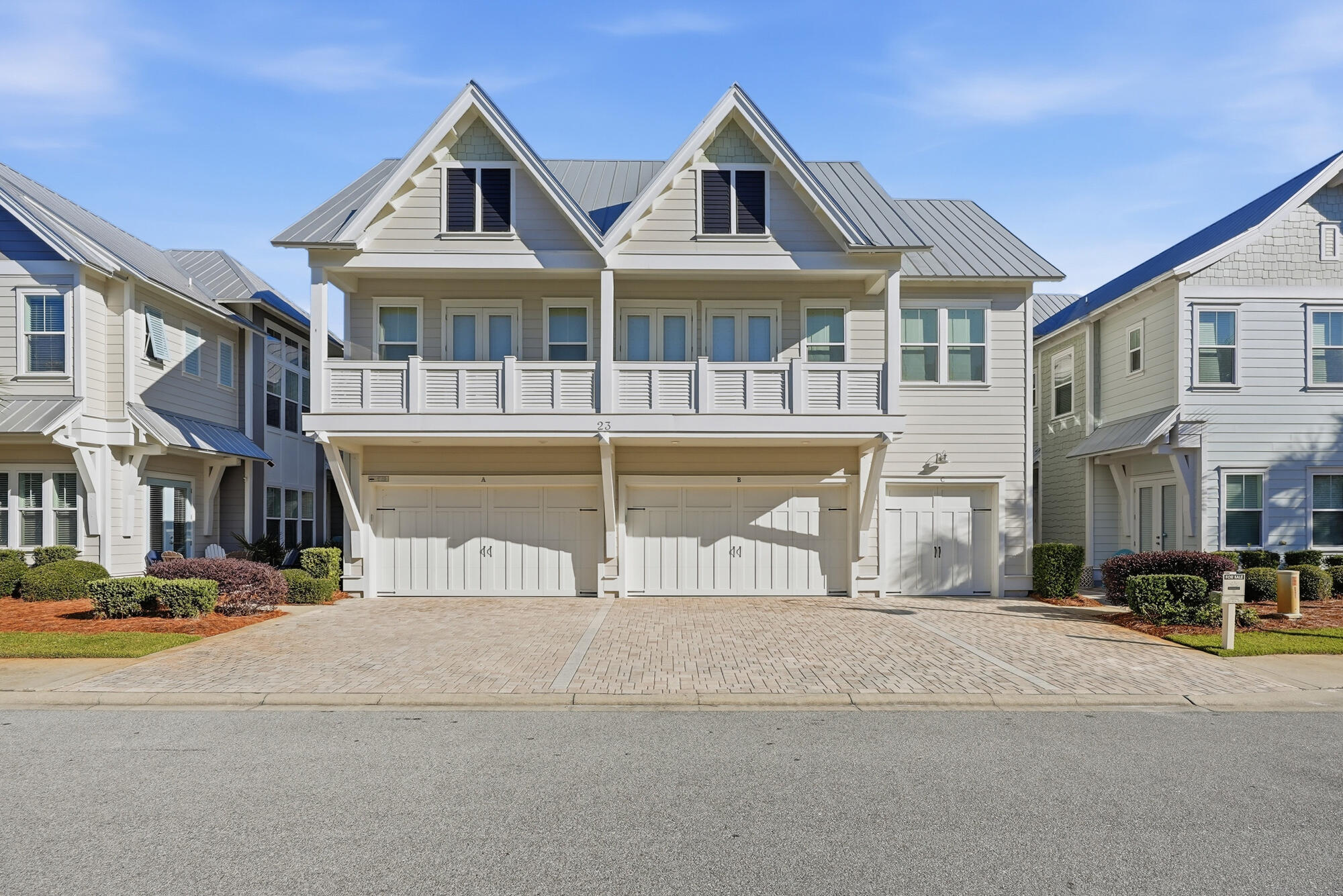 23 East York Ln Inlet Beach, Unit A Inlet Beach, FL 32461 - Photo 3 of 51 a view of a brick house with a swimming pool