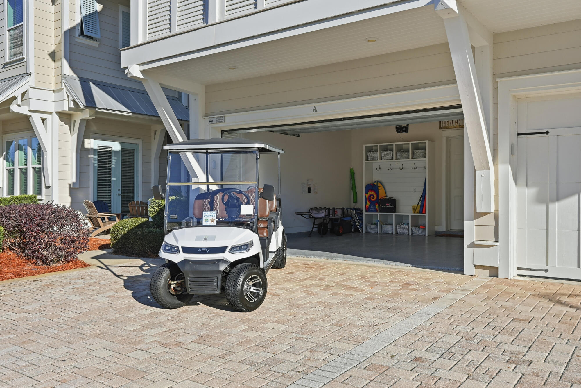 23 East York Ln Inlet Beach, Unit A Inlet Beach, FL 32461 - Photo 31 of 51 a view of a porch with table and chairs