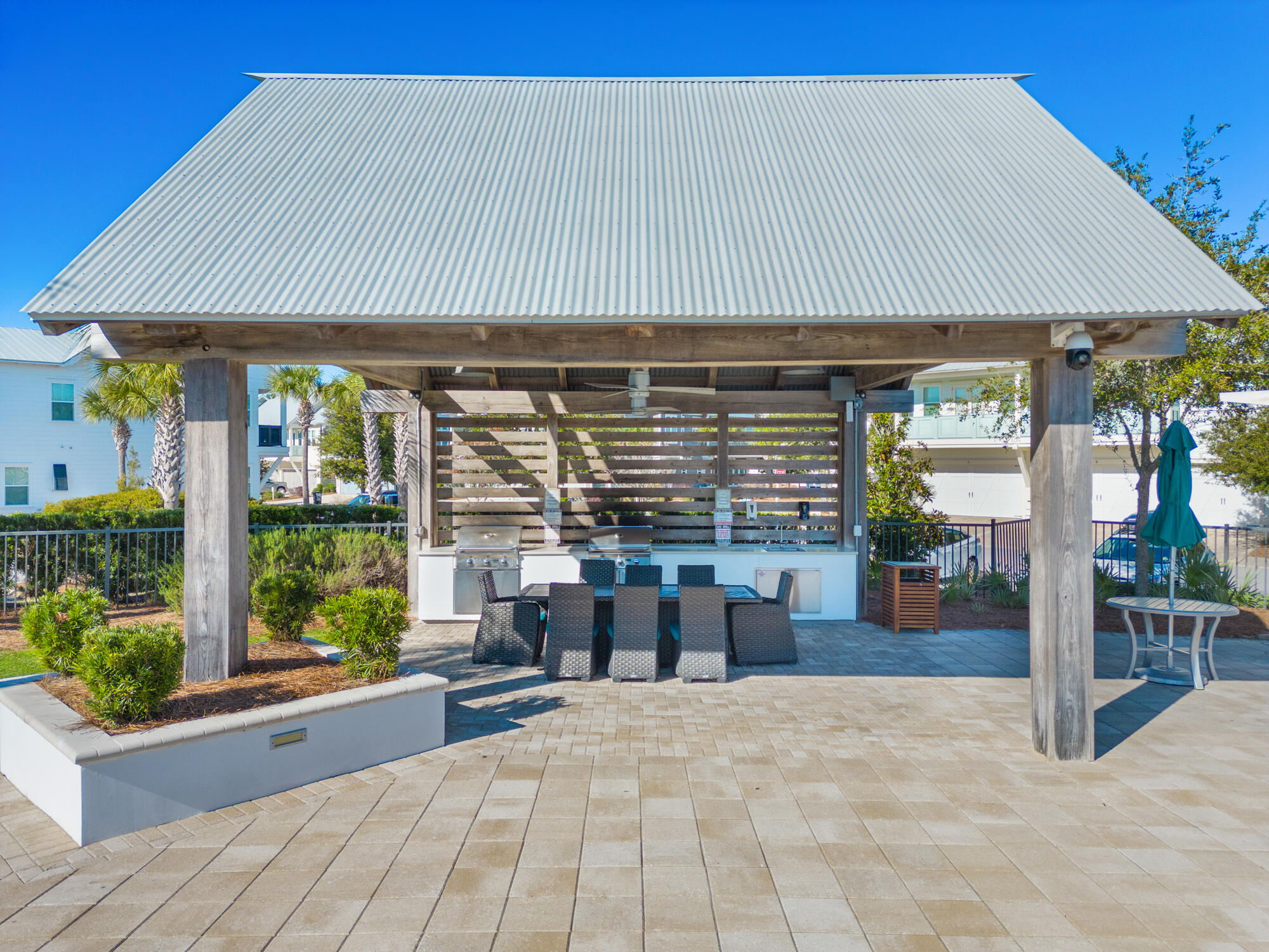 23 East York Ln Inlet Beach, Unit A Inlet Beach, FL 32461 - Photo 43 of 51 a view of a house with porch and sitting area