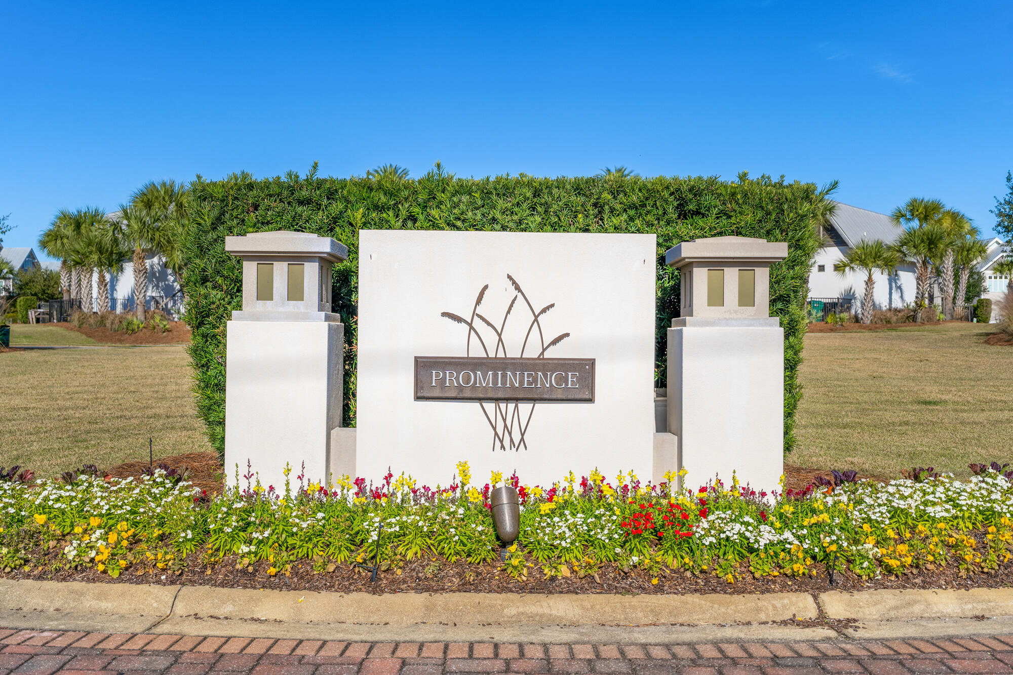 23 East York Ln Inlet Beach, Unit A Inlet Beach, FL 32461 - Photo 50 of 51 a view of a sign board with flower in front of it
