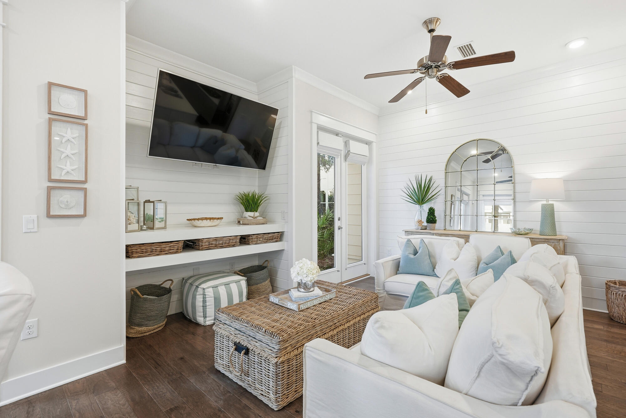 23 East York Ln Inlet Beach, Unit A Inlet Beach, FL 32461 - Photo 7 of 51 a living room with furniture and a flat screen tv
