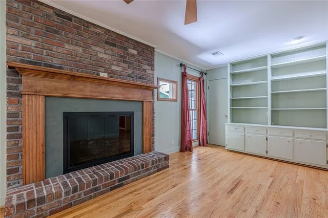 a bathroom with a sink a large mirror and a bathtub