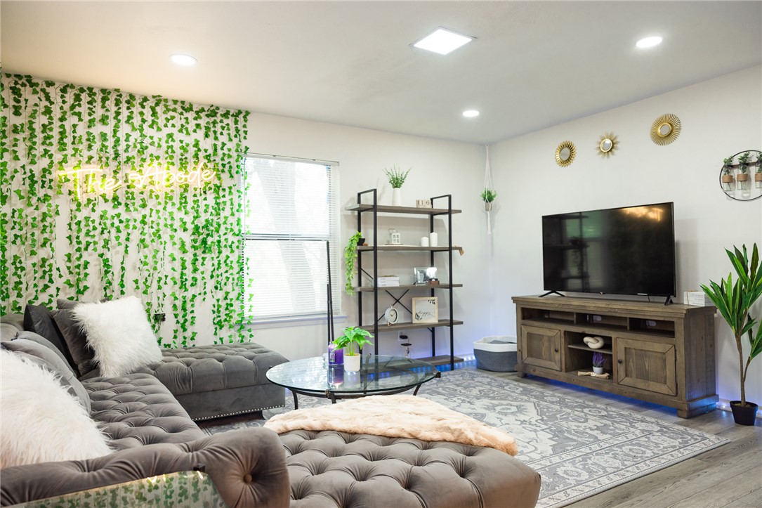 800 Navidad Street Bryan, TX 77801 - Photo 16 of 42 Living area featuring wood finished floors and recessed lighting